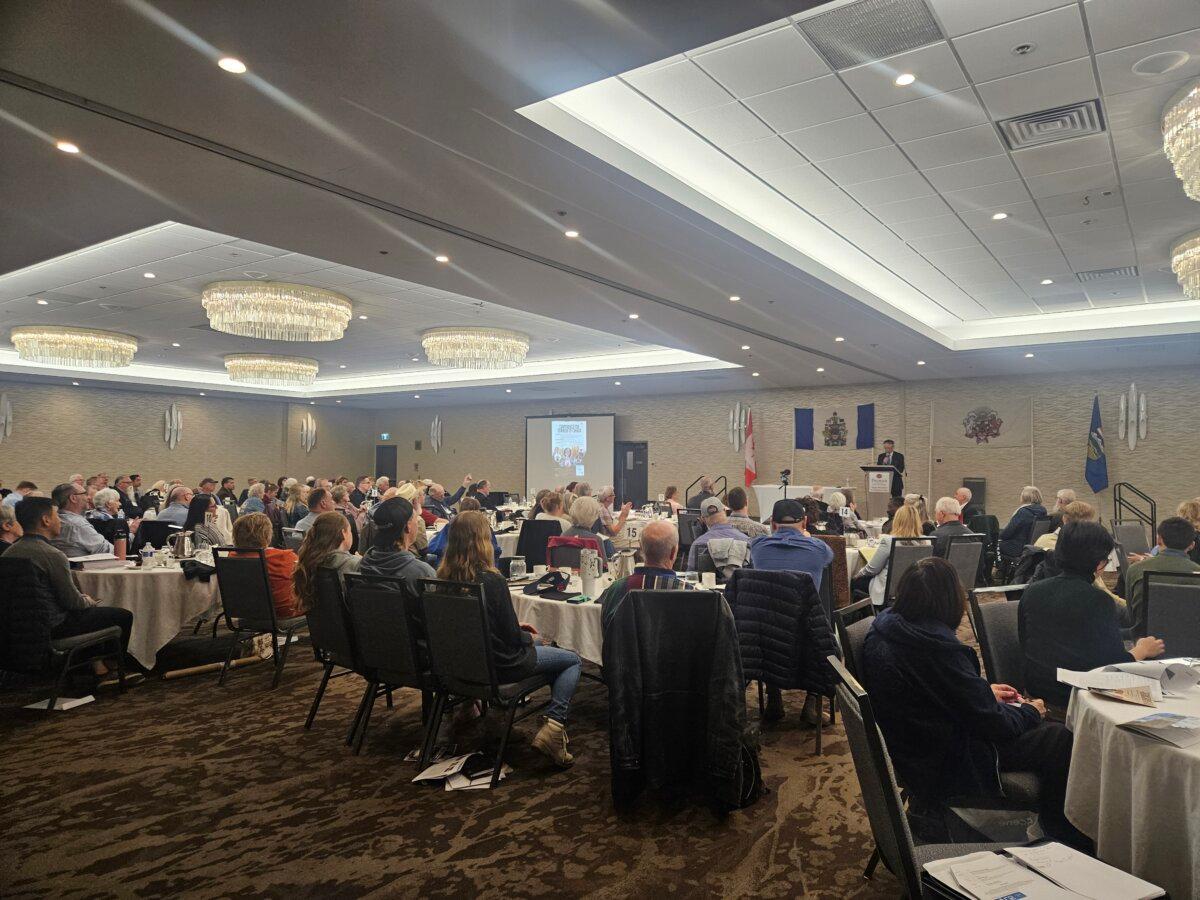 Audience members listen to speakers at the Conference for Dominion of Canada event in Calgary, on May 16, 2026. (Michael Wing/The Epoch Times)