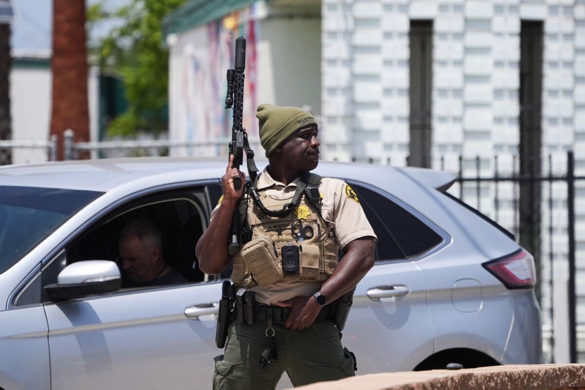 A sheriff's deputy stages at the scene of a shooting outside the Islamic Center of San Diego on May 18, 2026. (Gregory Bull/AP Photo)