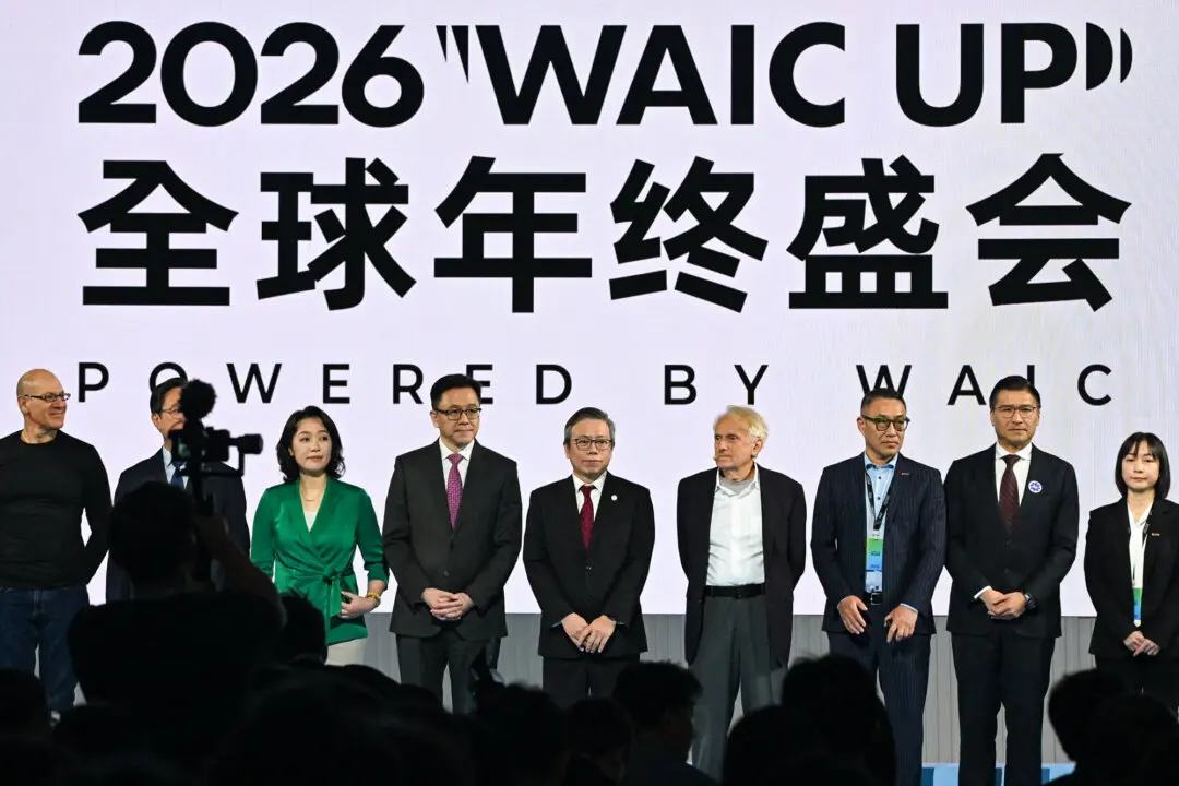 Leaders of AI startups join a group photo during the World Artificial Intelligence Conference at the Hong Kong Science Park in Hong Kong on Jan. 16, 2026. (Peter Parks/AFP via Getty Images)