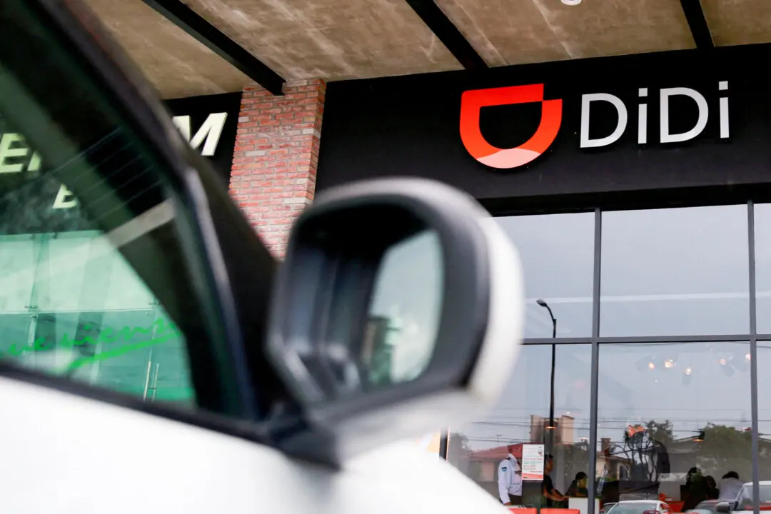 The logo of Chinese ride-hailing firm Didi Chuxing is seen at a driver center in Toluca, Mexico, on April 23, 2018. The company listed in New York in 2021 but was forced to delist after a regulatory crackdown from Beijing. (Carlos Jasso/Reuters)