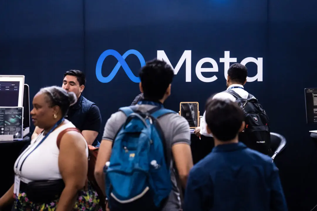 Meta Platforms is seen at a booth during the AI+ Expo Special Competitive Studies Project in Washington on June 2, 2025. On Dec. 29, 2025, Meta announced plans to acquire Manus for about $2 billion, but the deal later collapsed after Manus’ founders were trapped in Beijing. (Madalina Vasiliu/The Epoch Times)