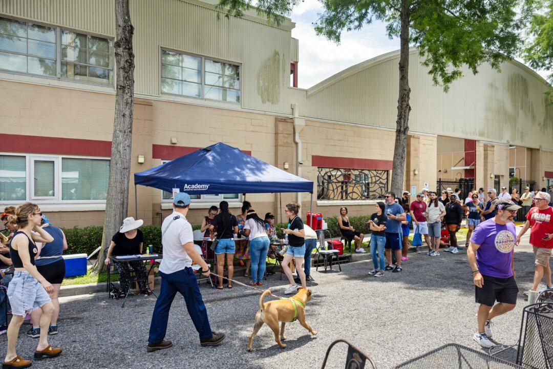Residents of Louisiana line up to sign a petition seeking to recall Gov. Jeff Landry on Primary Election Day in New Orleans on May 16, 2026. Rising costs for electricity, health care, gasoline, and groceries are driving the 2026 midterms’ top issue—affordability. (Kathleen Flynn/Getty Images)