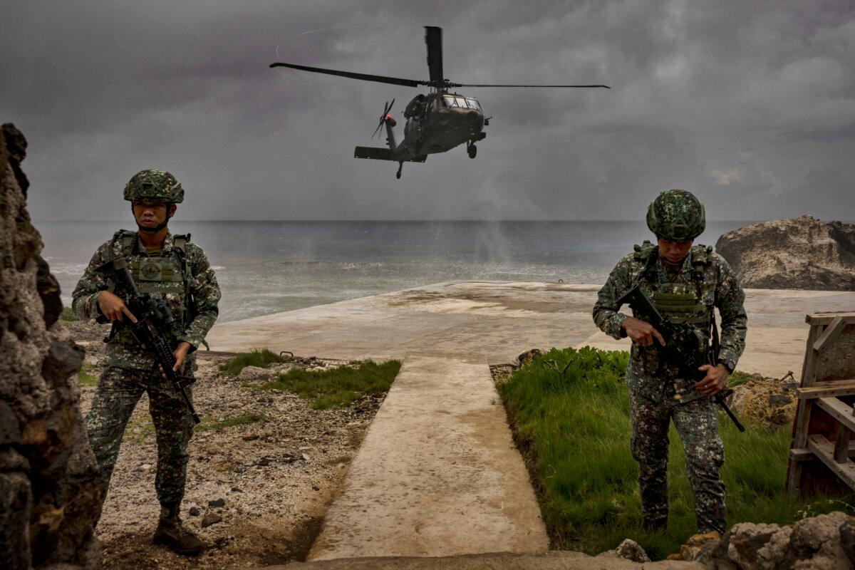 A Philippine Air Force Black Hawk helicopter lands in Mavulis Island, Batanes, Philippines, on June 29, 2023. (Ezra Acayan/Getty Images)