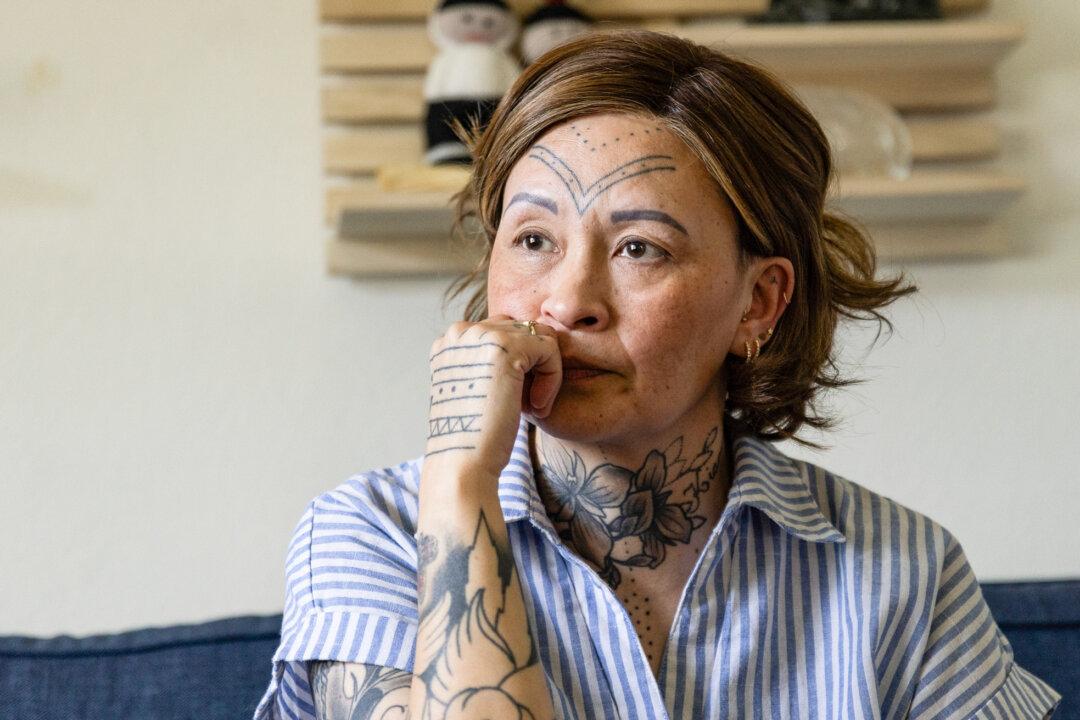 Bea Ferdinandsen Kaas sits in her home outside of Aarhus, Denmark, on April 22, 2026. (John Fredricks/The Epoch Times)