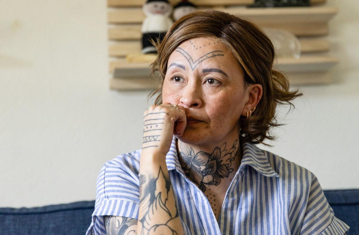 Bea Ferdinandsen Kaas sits in her home outside of Aarhus, Denmark, on April 22, 2026. (John Fredricks/The Epoch Times)