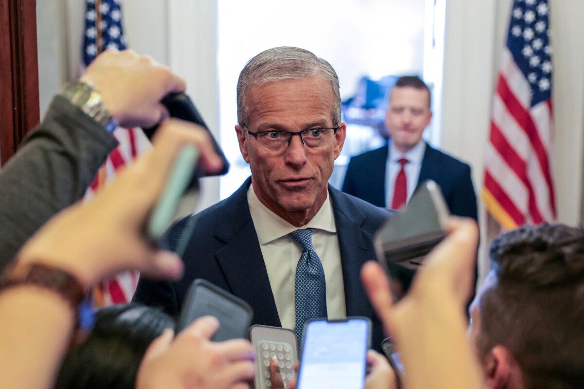 Senate Majority Leader John Thune (R-S.D.) speaks to reporters as he walks into his office at the U.S. Capitol Building in Washington on May 21, 2026. (Anna Moneymaker/Getty Images)