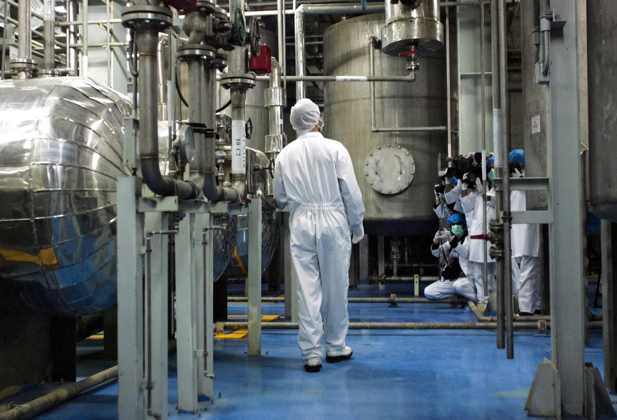 An Iranian technician walking at the Isfahan Uranium Conversion Facilities in Isfahan, Iran, in an undated file photograph. (Behrouz Mehri/AFP via Getty Images)