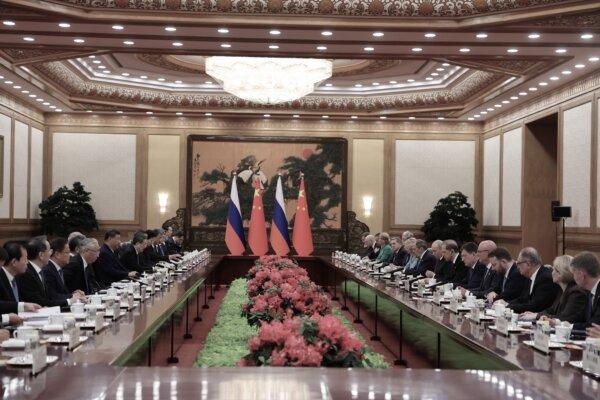 Russian President Vladimir Putin and Chinese President Xi Jinping attend a bilateral meeting at the Great Hall of the People in Beijing on May 20, 2026. (Maxim Shemetov - China Pool/Getty Images)