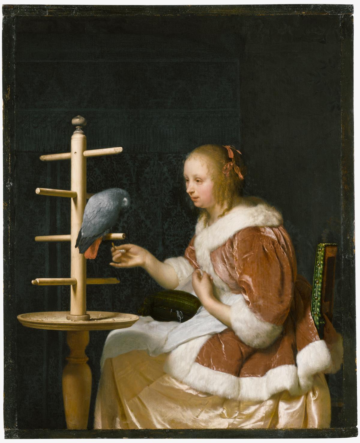 "Young Woman Feeding a Parrot," 1663, by Frans van Mieris. Oil on panel; 8 3/4 inches by 7 inches. (Courtesy of The Leiden Collection, New York)