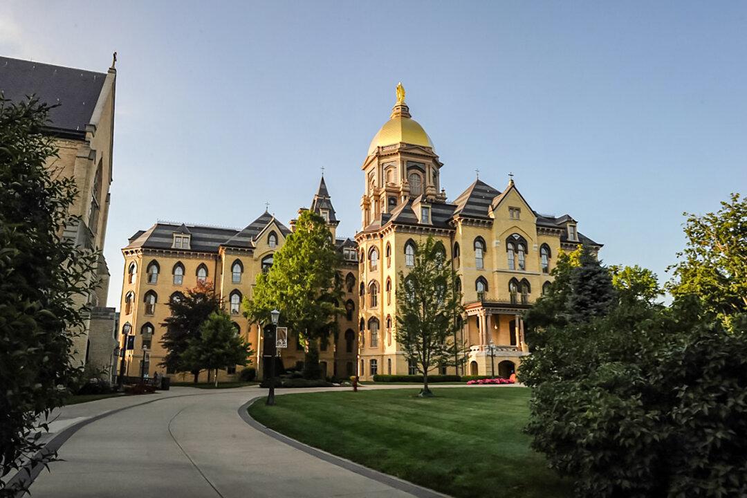 The Main Building on the campus of the University of Notre Dame in South Bend, Ind., on July 13, 2017. A 2019 study led by the university found that nearly 90 percent of graduates from schools accredited by the Association of Classical Christian Schools completed a four-year degree or higher, exceeding rates for other school types. (Nova Safo/AFP via Getty Images)