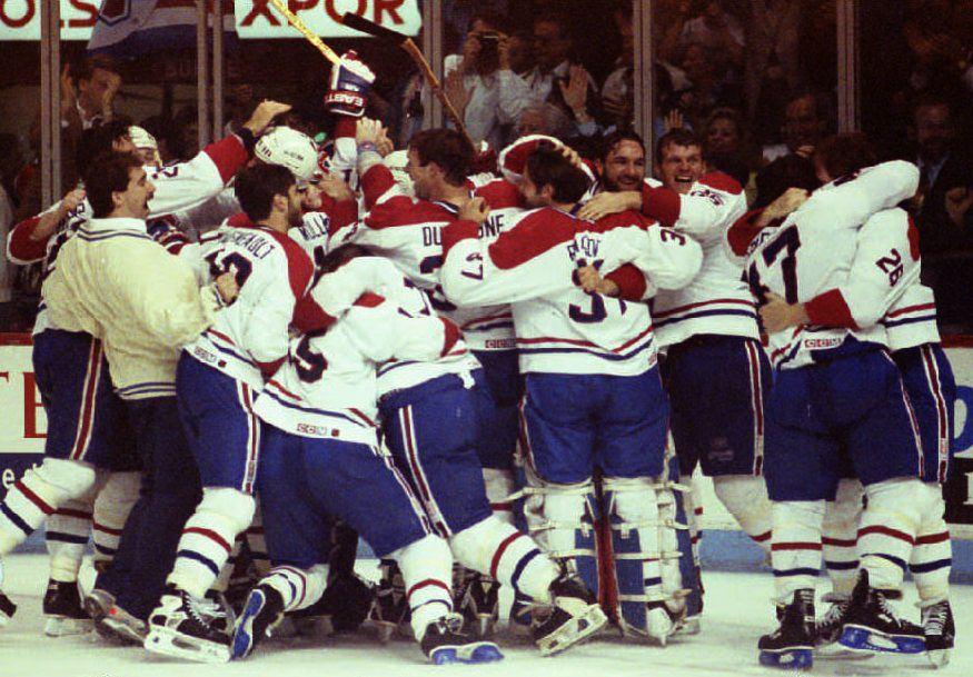 The Montreal Canadiens meet on the ice to celebrate their Stanley Cup victory on June 9 1993. (AFP via Getty Images)