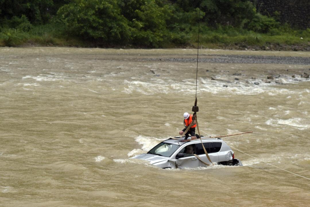 At Least 9 Dead in Chongqing Floods as Residents Question Reservoir Role