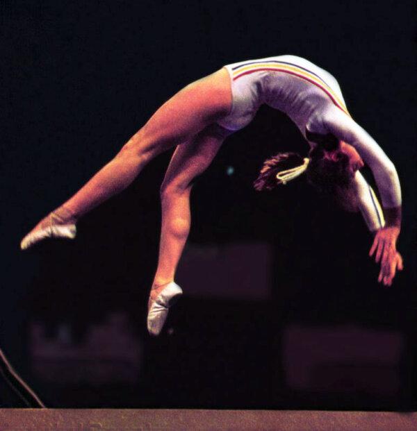 Nadia Comaneci symbolized flawless harmony when she became the first gymnast to earn a perfect 10 at the Olympic Games. (Public Domain)