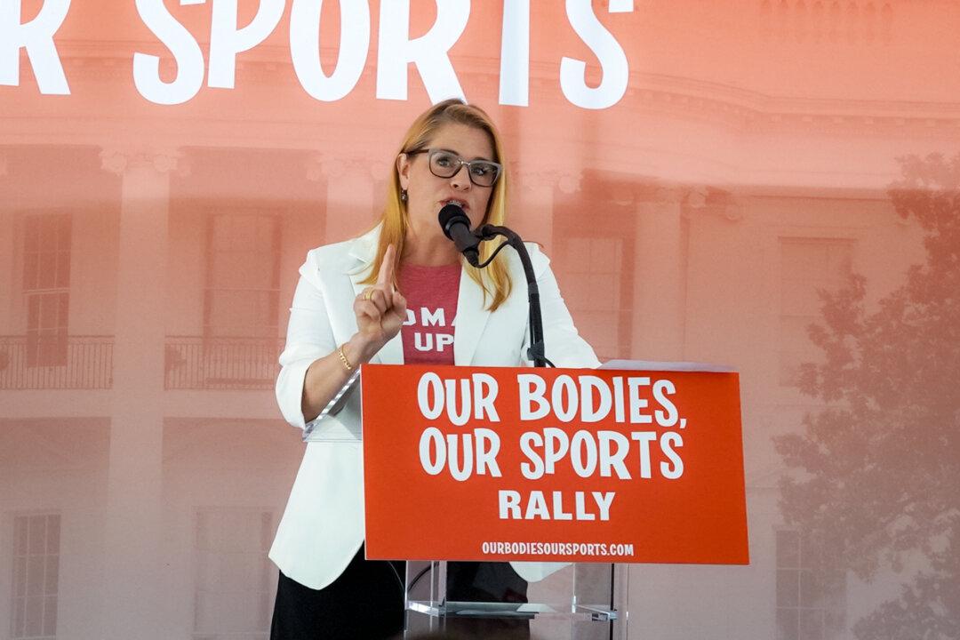 Sarah Marshall Perry, a senior legal fellow at the Heritage Foundation, speaks at the “Our Bodies, Our Sports” rally at Freedom Plaza in Washington on June 23, 2022. (Terri Wu/The Epoch Times)