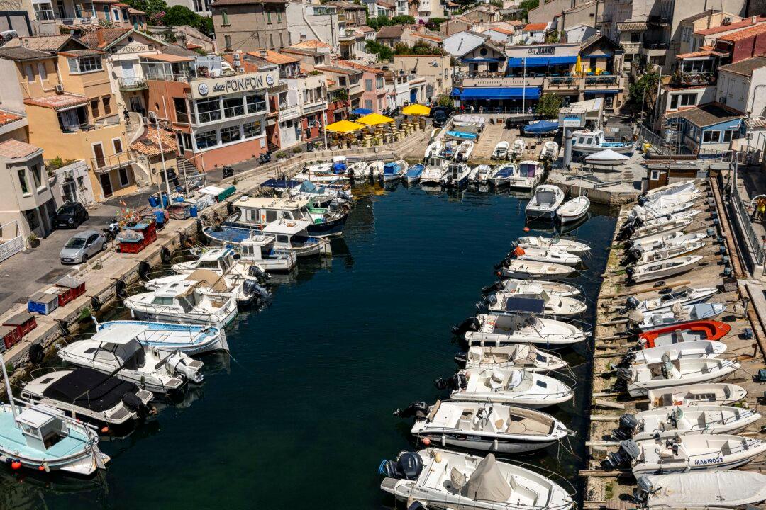 This picture taken on May 27, 2026 shows pleasure boats moored in the marina of Port du Vallon des Auffes near La Corniche in Marseille, southeastern France. (Photo by MIGUEL MEDINA / AFP via Getty Images)