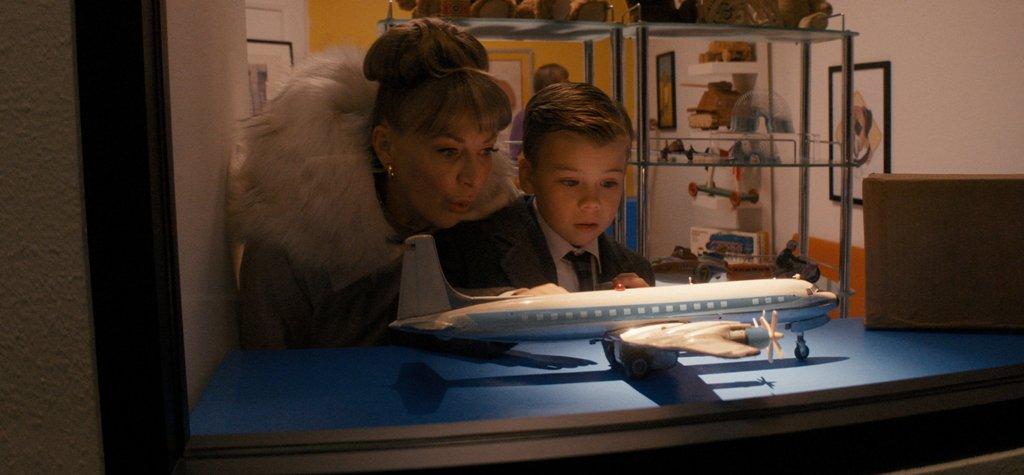 Helen (Kelly Eviston-Quinnett) and her son, Jeff (Clark Shotwell), in "Propeller One-Way Night Coach." (Apple+)