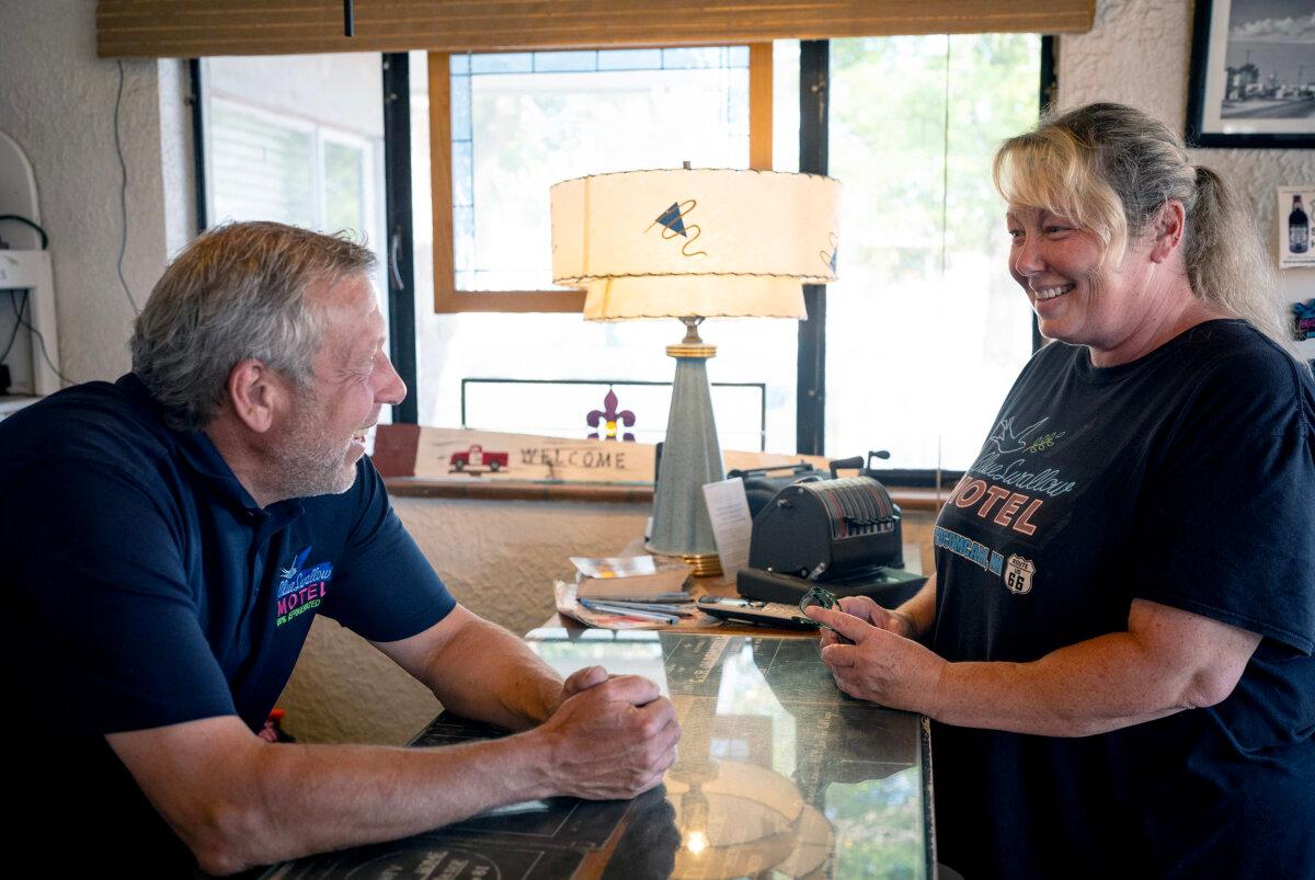 Robert and Dawn Federico, originally from Crystal Lake, at the historic Blue Swallow Motel on Route 66 in Tucumcari, N.M., in 2020. (E. Jason Wambsgans/Chicago Tribune/TNS)