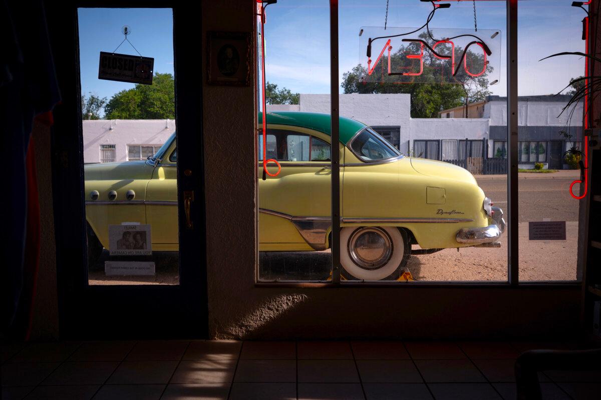 A vintage Buick sits outside the Blue Swallow Motel on Route 66 in Tucumcari, N.M., June 11, 2025. (E. Jason Wambsgans/Chicago Tribune)