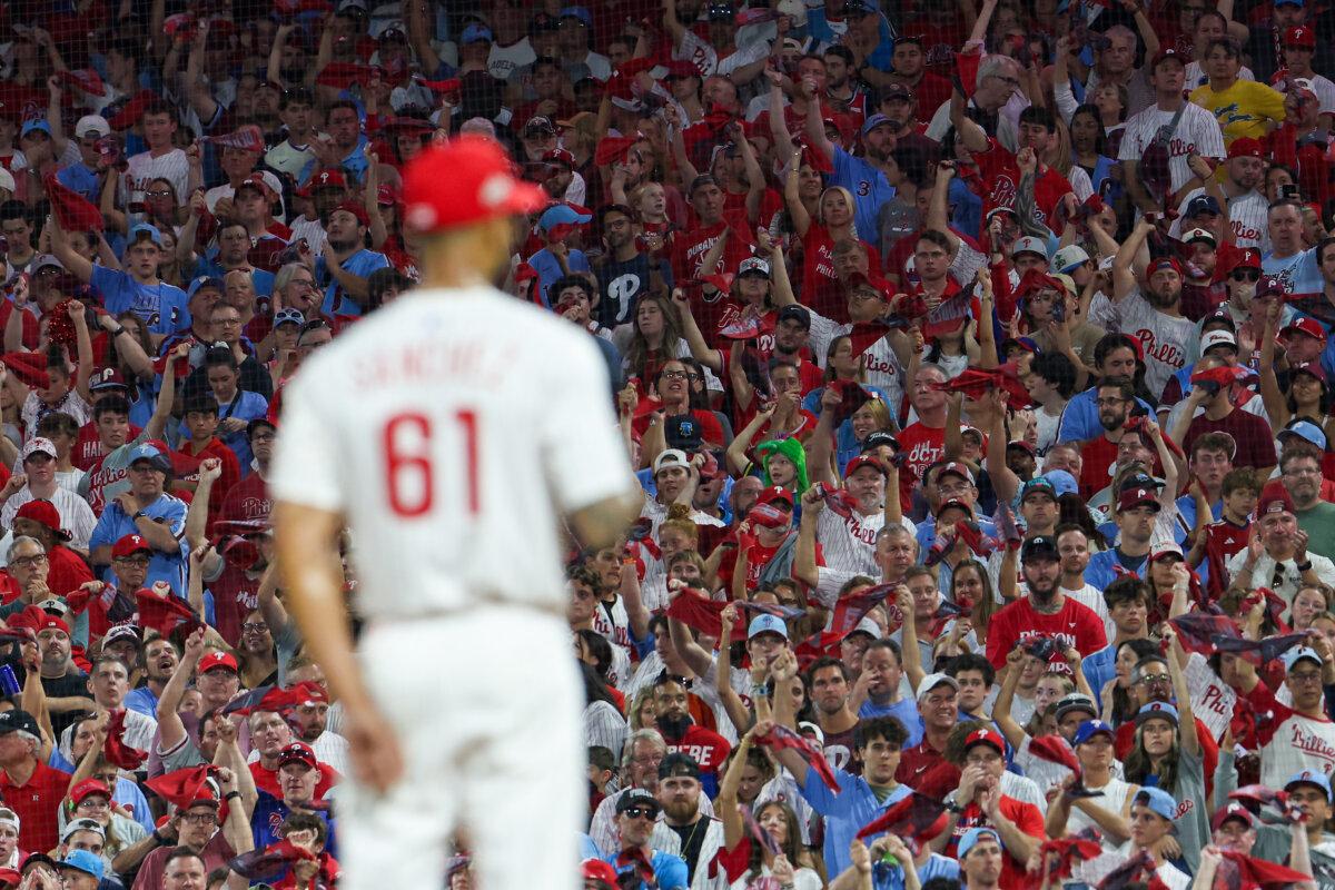 Fans cheer as Cristopher Sanchez of the Philadelphia Phillies looks on during the second inning of game one of the Division Series at Citizens Bank Park in Philadelphia on Oct. 4, 2025. (Emilee Chinn/Getty Images)