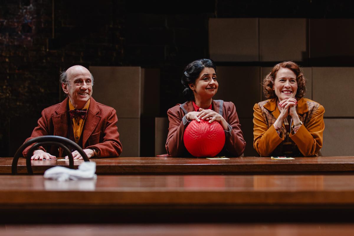 (L–R) Mr. Benjamin (Patrick Kerr), Mrs. Frisbee (Mahira Kakkar), and Miss Coley (Eva Kaminsky), in "The Emporium." (Marc J. Franklin)