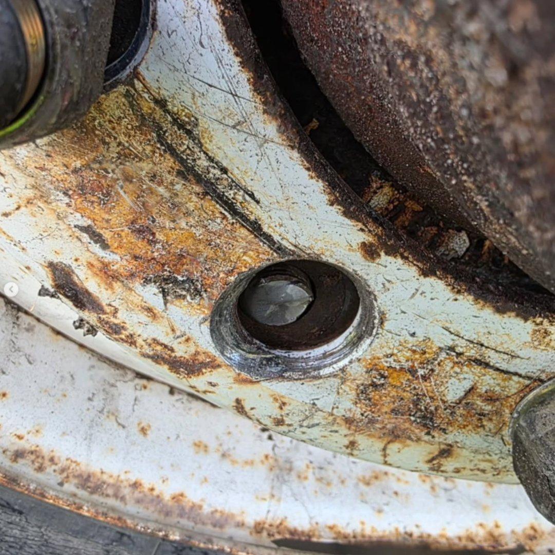 A wheel missing a wheel fastener on a trailer missing multiple wheels. (Ottawa Police)