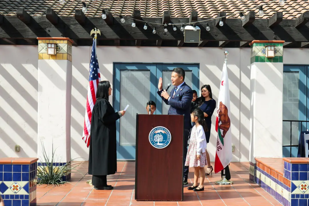 Rep. Derek Tran (D-Calif.) participates in a ceremonial swearing in at the Golleher Alumni House at California State University, Fullerton, in Fullerton, Calif., on Feb. 24, 2025. Tran, a Democrat, is the son of Vietnamese refugees; his top four challengers for the 45th District are Republicans—and all are Vietnamese refugees. (Rep. Derek Tran/public domain)