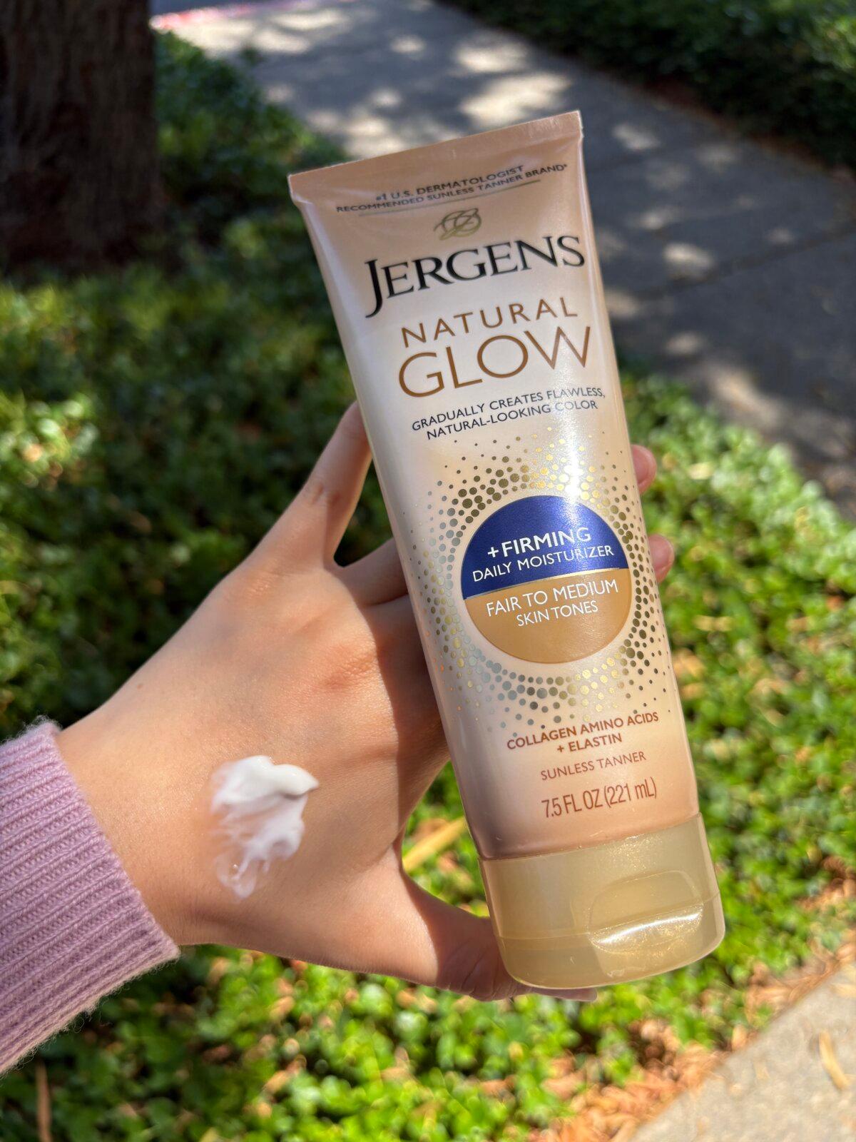 Jergens Natural Glow Gradual Tanning Lotion. Show in hand with a swatch