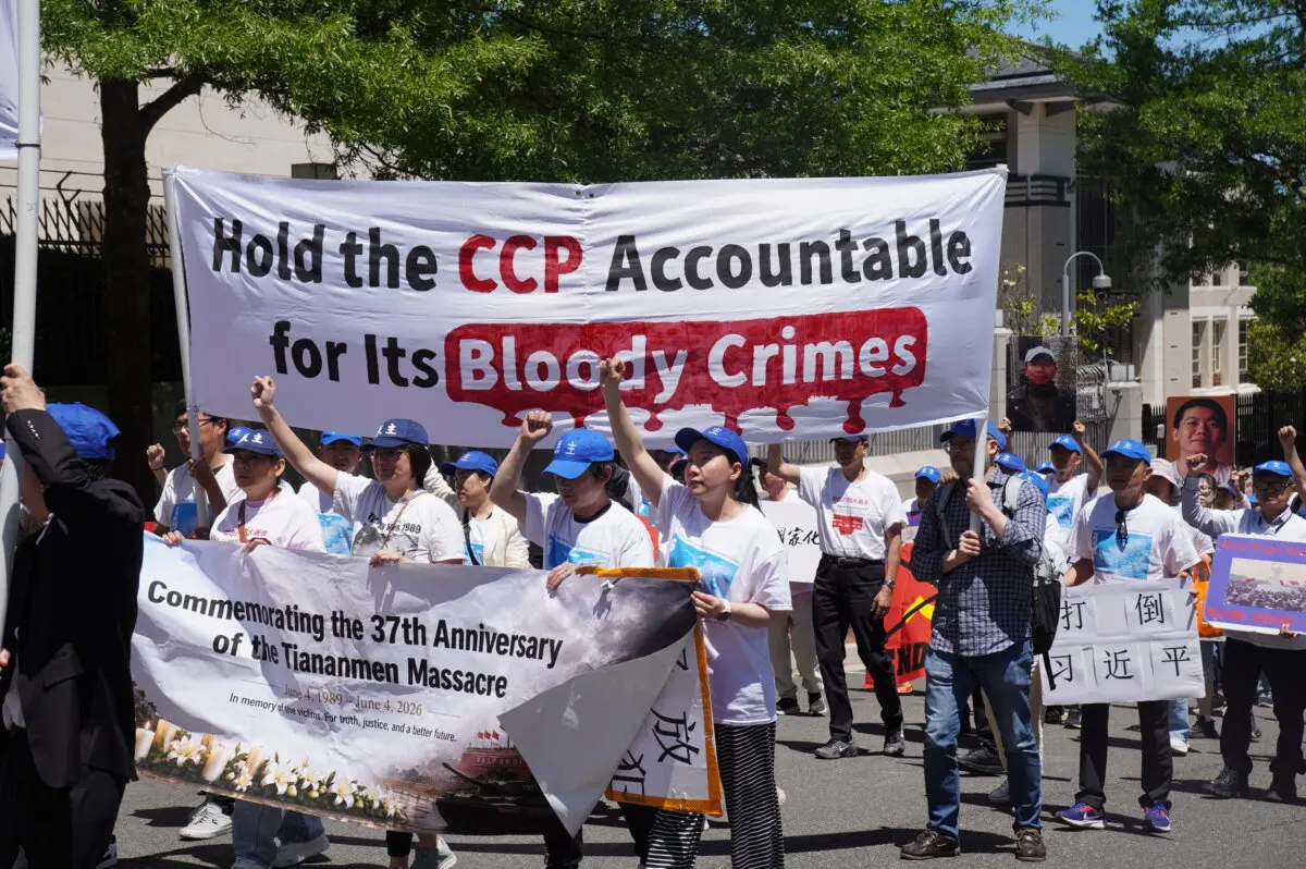 Chinese dissidents and democracy activists hold a rally in front of the Chinese Embassy in Washington to commemorate the 37th anniversary of the Tiananmen Square massacre and to demand democracy in China, on May 30, 2026. (Li Chen/The Epoch Times)
