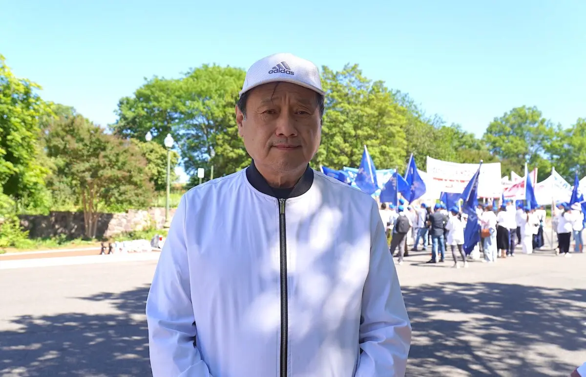 Wang Juntao, U.S.-based chairman of the National Committee of the China Democracy Party, at the pro-democracy rally commemorating the 1989 Tiananmen Square massacre in front of the Chinese Embassy in Washington on May 30, 2026. (Li Chen/The Epoch Times)
