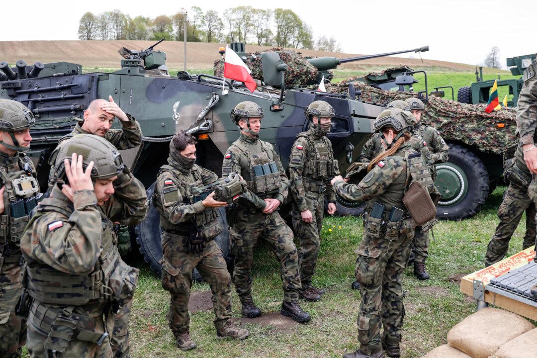 Polish troops are seen on the sidelines of the Lithuanian-Polish joint military exercise 'Brave Griffin 26/II' near Akmenynu, Alytus district, Lithuania, on May 6, 2026. The idea of a European army dates back to the Eisenhower administration, which once persuaded European leaders to agree to create one. (Petras Malukas/AFP via Getty Images)
