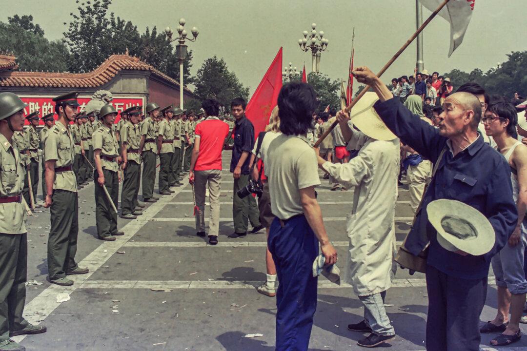 People gather near Zhongnanhai, the Chinese leadership compound, following the death of reform-minded leader Hu Yaobang in Beijing in 1989. (Provided to The Epoch Times)
