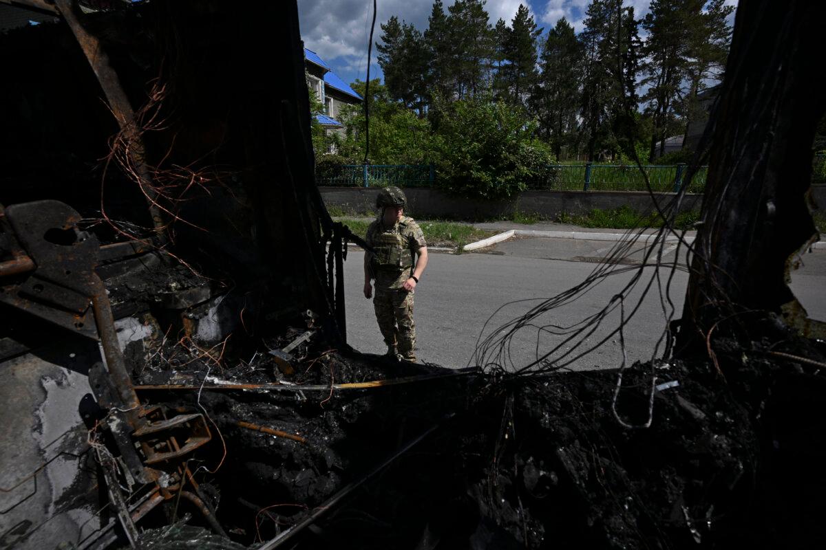 The site of a drone strike on a bus in the settlement of Yenakiyeve in the Donetsk region, Russian-controlled Ukraine, amid the ongoing Russian-Ukrainian conflict. A drone attack killed seven people and wounded 11 as it hit a bus on June 3, 2026. (AFP via Getty Images)