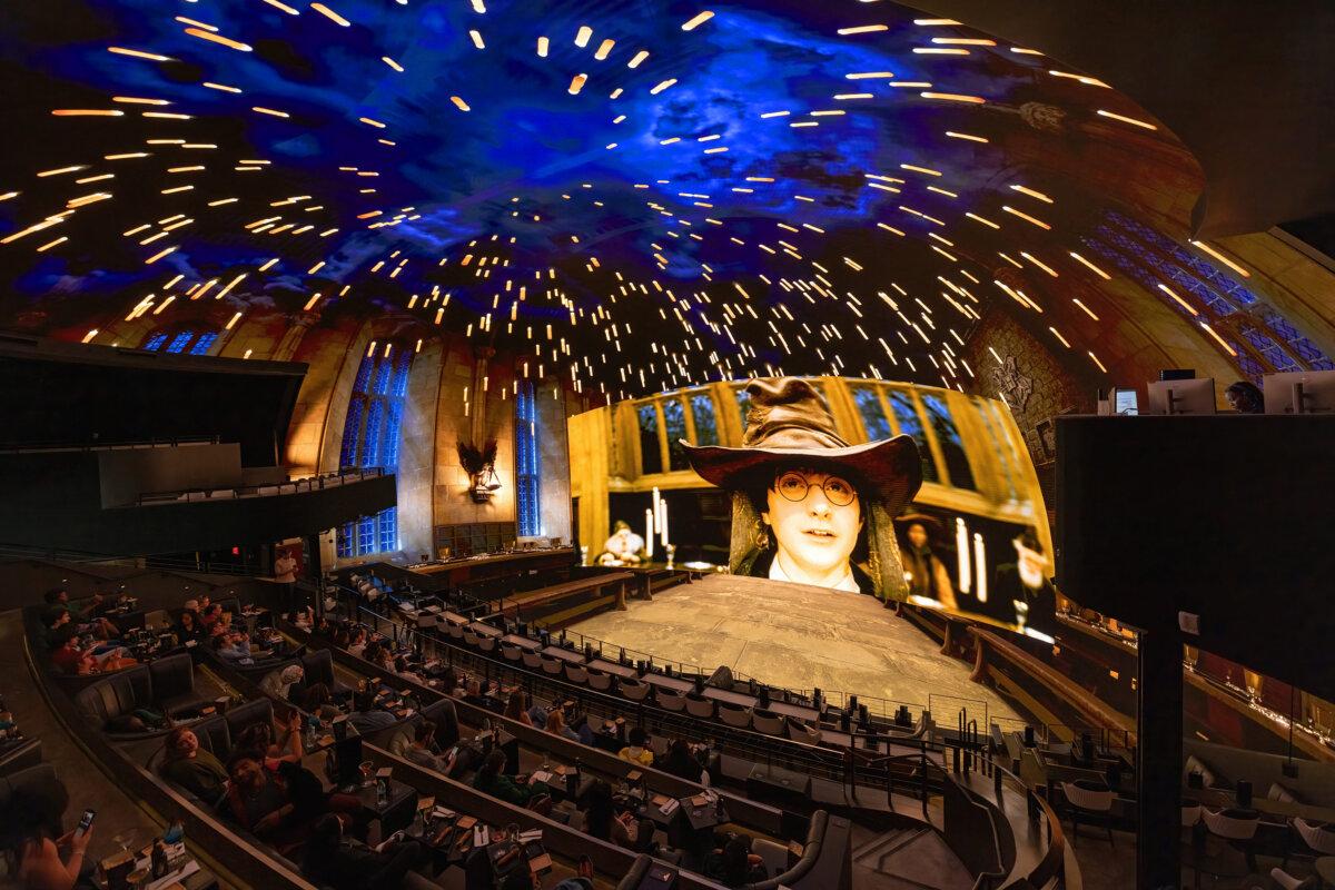 The famed “sorting hat” scene at Cosm’s interpretation of “Harry Potter and the Sorcerer’s Stone.” (Stefan Silvers/Cosm/TNS)