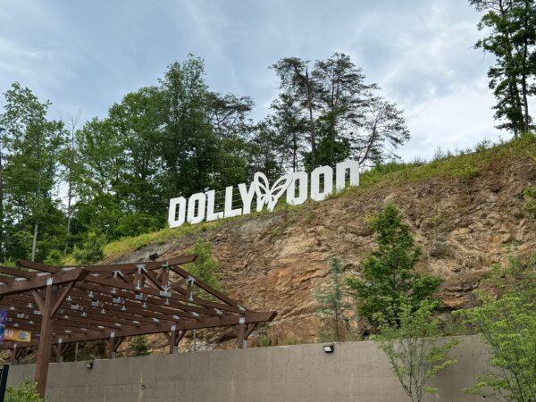 The newly erected Dollywood sign proudly sits on the hillside near the train station, offering a Hollywood-style welcome to visiting fans. (Lynn Topel)