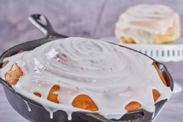 Fluffy, warm, and dripping with icing, Dollywood's signature cinnamon bread is the park's undisputed culinary star. (Dollywood Parks & Resorts)