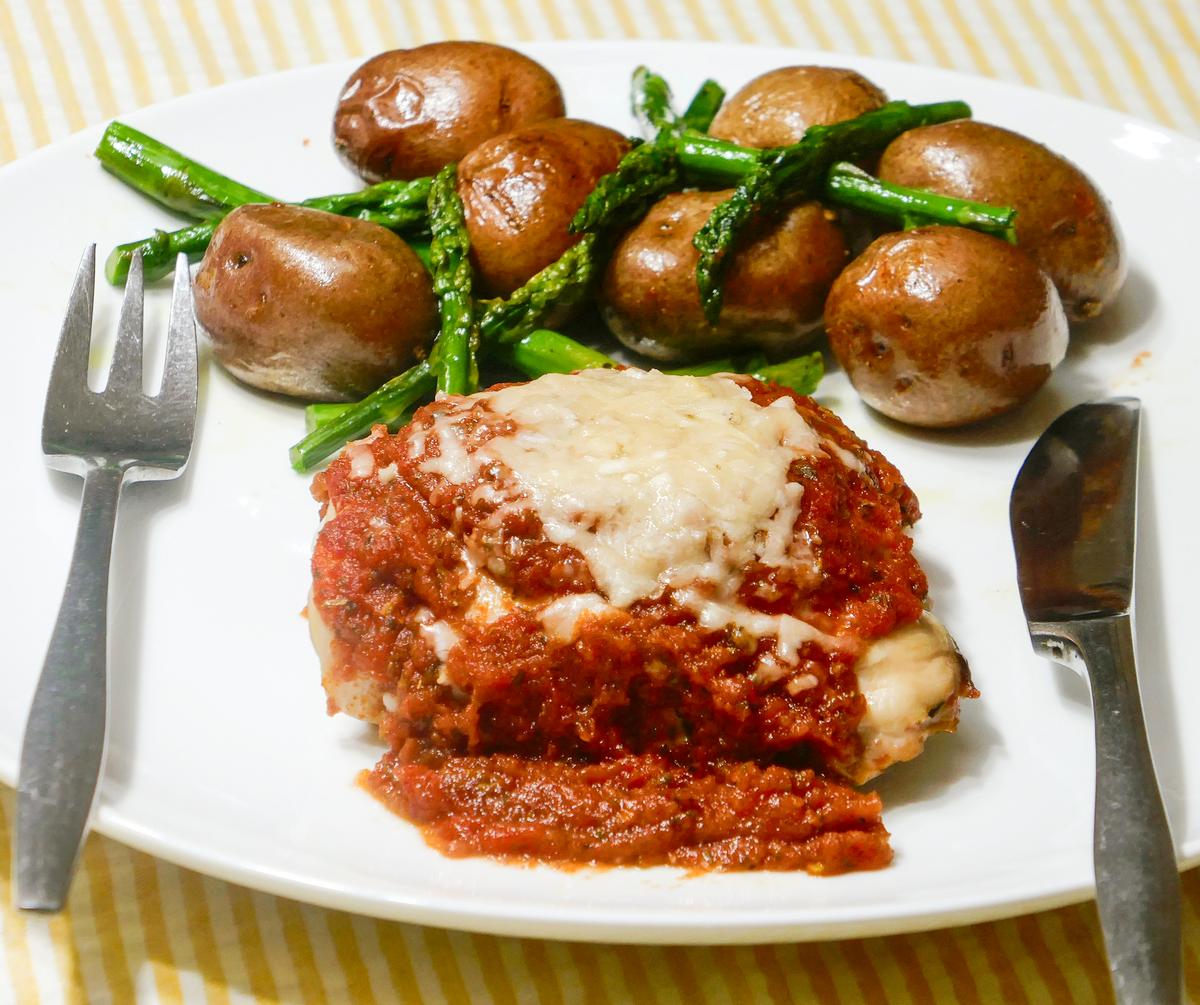 Savory Oven-Baked Chicken Thighs With Roasted Potatoes and Asparagus
