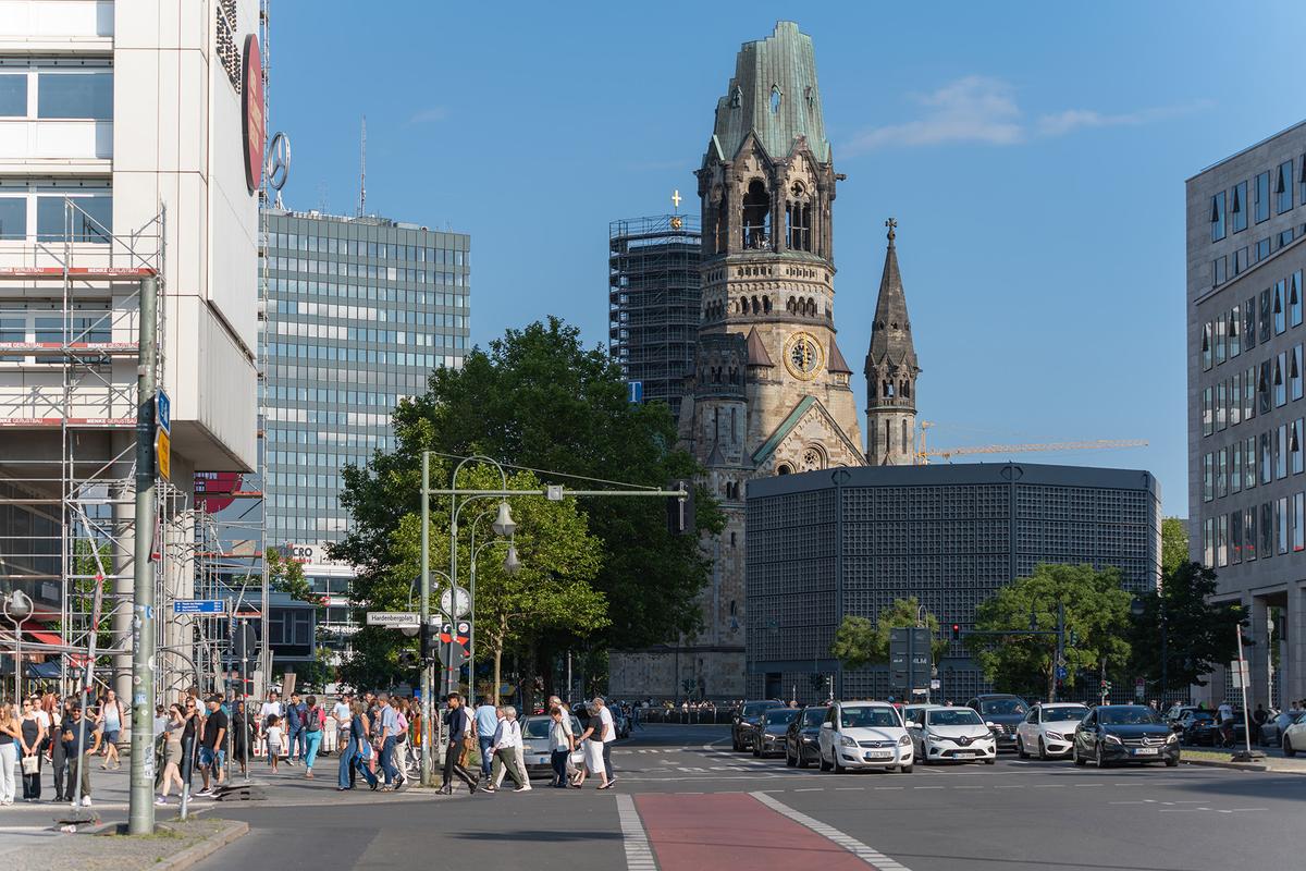 Originally built in the 1890s in a grand Neo-Romanesque style, Kaiser Wilhelm Memorial Church sustained heavy damage during World War II air raids. (Jakob Berg/Shutterstock)