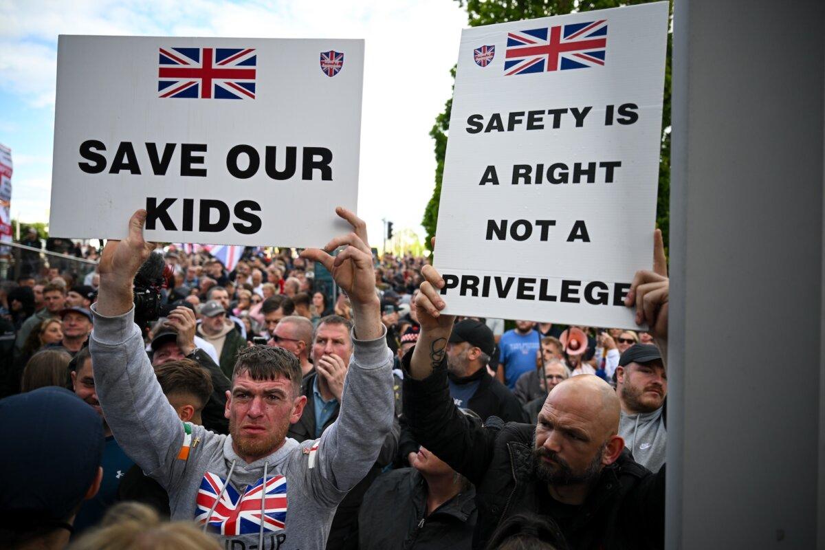 People attend a protest about the police's handling of the arrest of Henry Nowak outside a police station in Southampton, England, on June 2, 2026. (Finnbarr Webster/Getty Images)