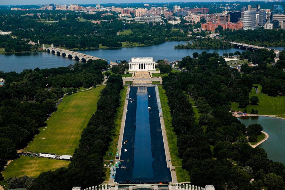 WASHINGTON, DC - JUNE 05: The Lincoln memorial Reflecting Pool is partially filled with water on June 05, 2026 in Washington, DC. Painting the landmark pool is part of President Donald Trump's effort to repair Washington landmarks in for preparation the country’s 250th birthday this summer. (Photo by Chip Somodevilla/Getty Images)