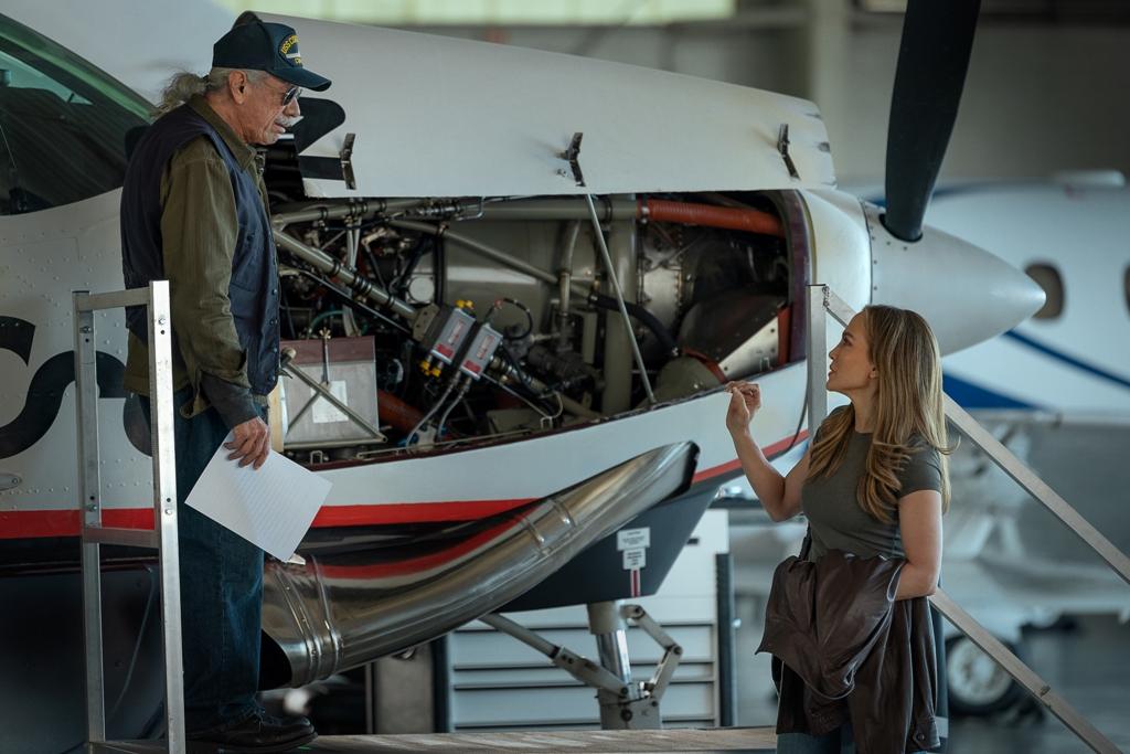 "Captain Jack" Cruz (Edward James Olmos) and his daughter Jackie (Jennifer Lopez), in "Office Romance." (Ana Carballosa/Netflix)