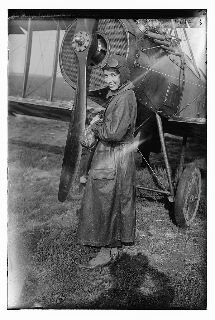 Photo shows American aviator Katherine Stinson (1891–1977) in front of her Curtiss-Stinson Special biplane that she flew to raise funds for the Red Cross during World War I. Library of Congress. (Public Domain)