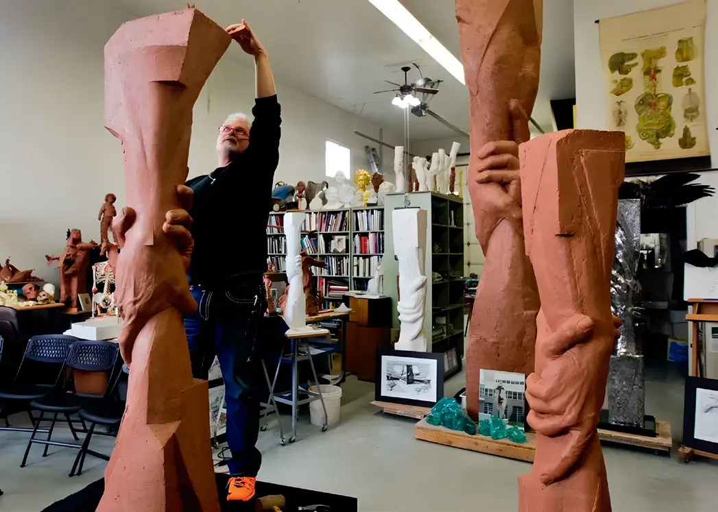 Price working in his studio on a 15-foot model of the statue. (Courtesy of Leesa and Gary Price)