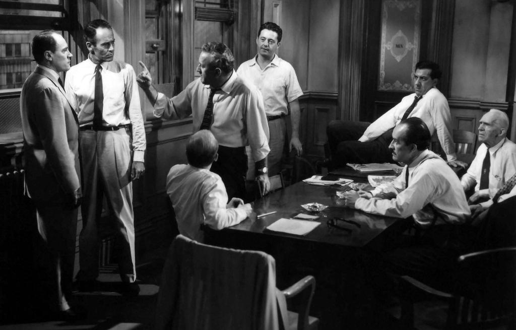 Davis (Henry Fonda, 2nd L) is a holdout for an acquittal, in "12 Angry Men." (United Artists)