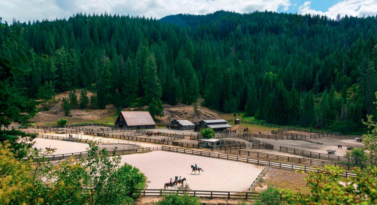 The main riding area of Red Horse Mountain Ranch is tucked into a private valley surrounded by forested mountains. (Maria Coulson)