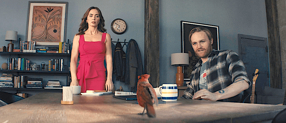 Margaret Fairchild (Emily Blunt), her partner Jackson (Wyatt Russell), and a feathered envoy whose presence causes her to speak fluent Russian without realizing it, in "Disclosure Day." (Universal Pictures)