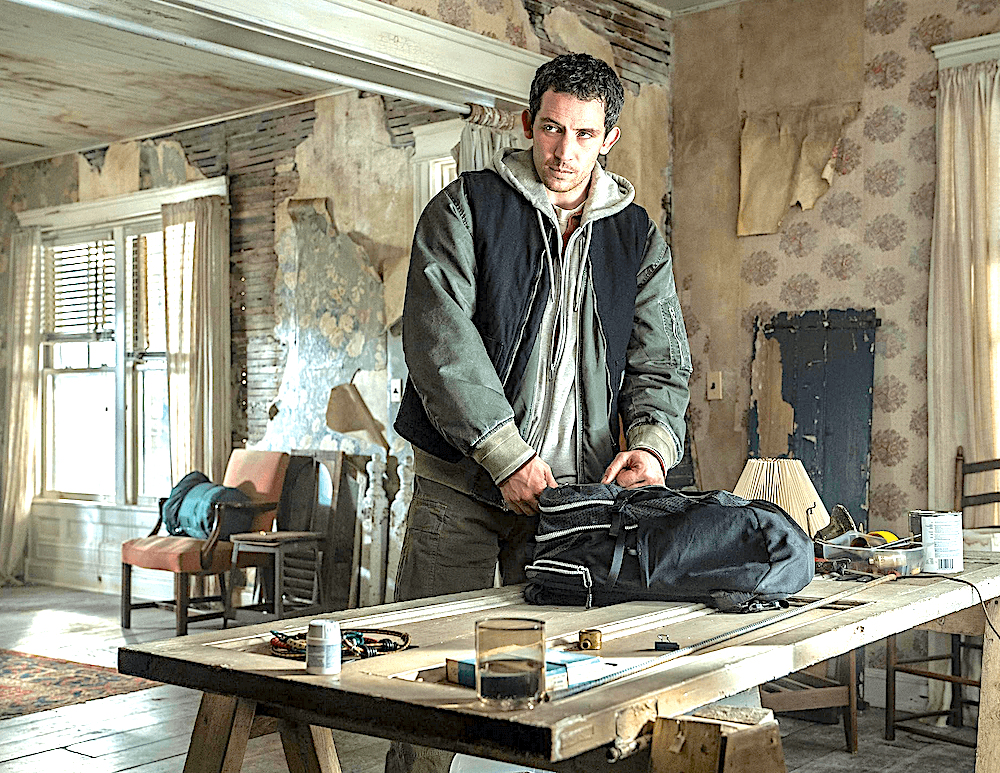 Daniel Kellner (Josh O'Connor) getting ready to make a run for it, carrying stolen information, in "Disclosure Day." (Universal Pictures)