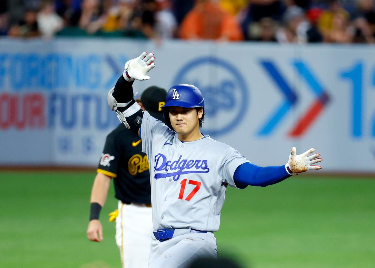 Shohei Ohtani of the Los Angeles Dodgers reacts after hitting an RBI double in the seventh inning against the Pittsburgh Pirates at PNC Park in Pittsburgh on June 9, 2026. (Justin K. Aller/Getty Images)