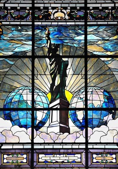 "Liberty Enlightening the World, or The Statue of Liberty," a stained glass window commissioned by Pulitzer to commemorate the New York World's fundraising for the pedestal of the Statue of Liberty. Originally installed in the New York World Building, it was moved to Pulitzer Hall at Columbia University. (Public Domain)