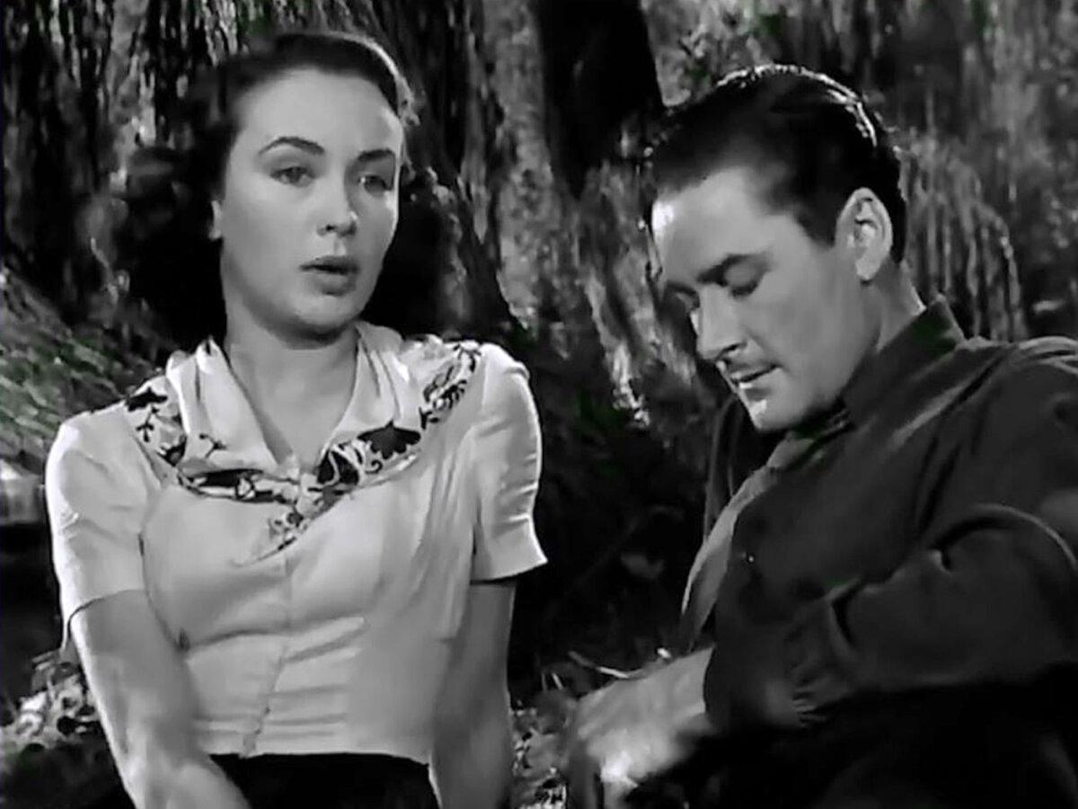 Marianne (Jean Sullivan) and Jean Picard (Errol Flynn), in “Uncertain Glory.” (Warner Bros.)
