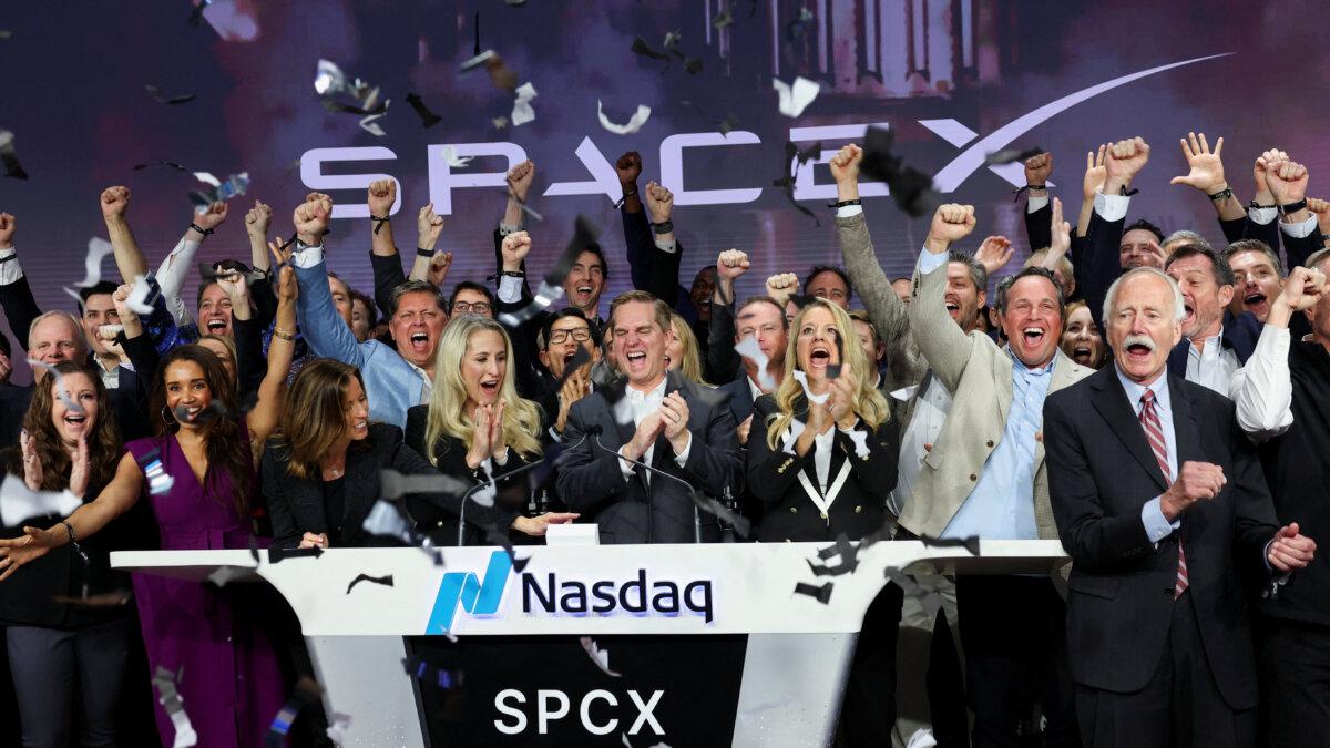 President and COO of SpaceX, Gwynne Shotwell, and CFO and President of Strategic Acquisitions, Bret Johnsen, ring the opening bell with company leaders during SpaceX’s IPO at the Nasdaq MarketSite in New York on June 12, 2026. (Reuters/Brendan McDermid)